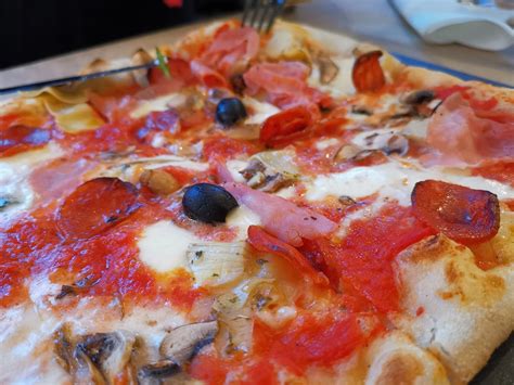 Mano's pizza - Mano means "hand" and pizza is a craft. That is why we make it by hand in the traditional Neapolitan way.